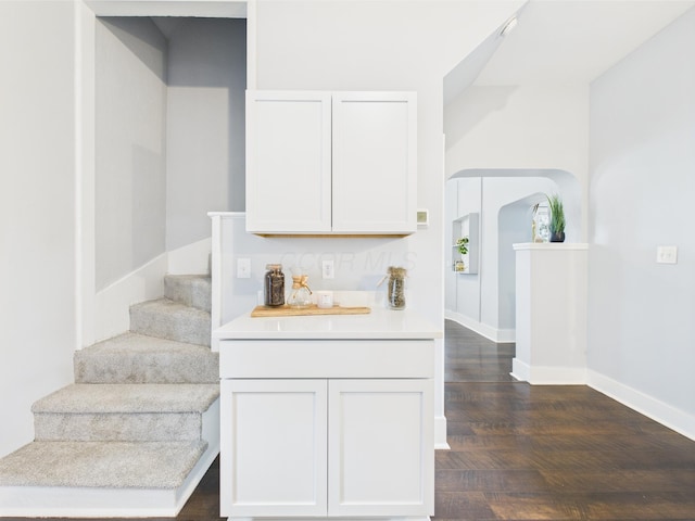 715 N Broad St, Lancaster, OH 43130 - staircase with wood finished floors and baseboards