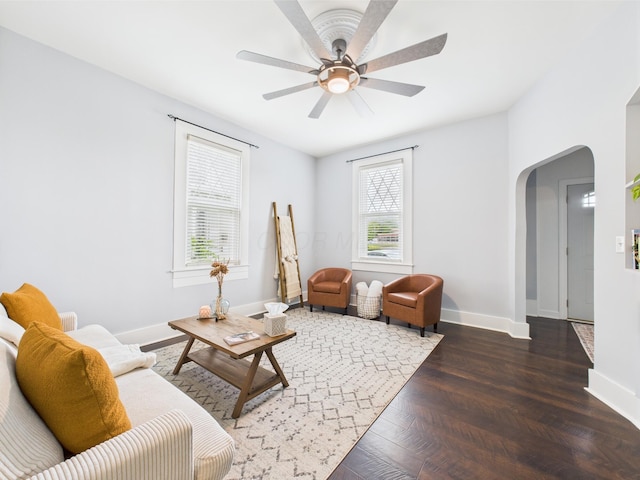 715 N Broad St, Lancaster, OH 43130 - living room with arched walkways, a ceiling fan, and baseboards