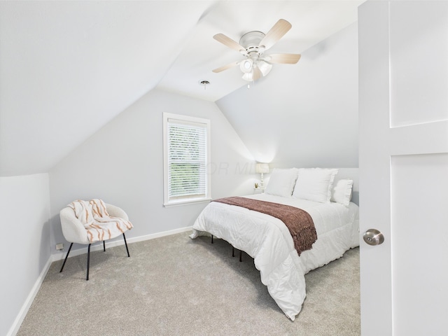 715 N Broad St, Lancaster, OH 43130 - bedroom with carpet floors, vaulted ceiling, a ceiling fan, and baseboards