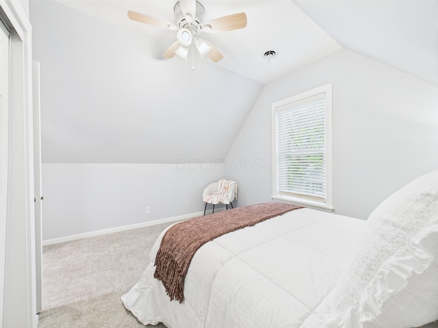 715 N Broad St, Lancaster, OH 43130 - carpeted bedroom featuring lofted ceiling, baseboards, and a ceiling fan