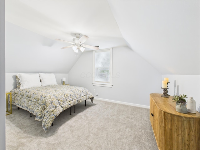 715 N Broad St, Lancaster, OH 43130 - bedroom with carpet, baseboards, lofted ceiling, and a ceiling fan