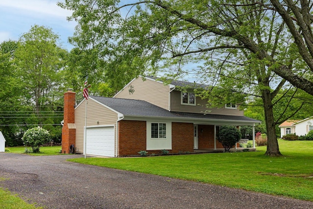 13789 Cobblestone Ln, Pickerington, OH 43147 - traditional home with an attached garage, brick siding, a porch, a front lawn, and a chimney