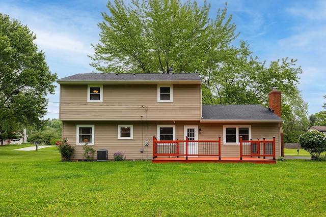 13789 Cobblestone Ln, Pickerington, OH 43147 - rear view of property with a yard, a deck, a chimney, and central AC