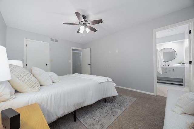 13789 Cobblestone Ln, Pickerington, OH 43147 - bedroom featuring carpet flooring, connected bathroom, baseboards, and a ceiling fan