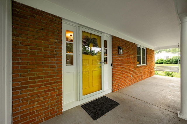 13789 Cobblestone Ln, Pickerington, OH 43147 - view of exterior entry with brick siding and covered porch
