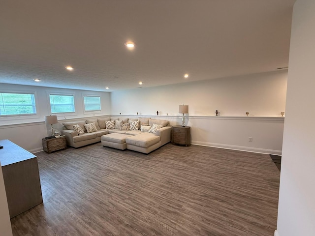 2497 Nelson Ln, Delaware, OH 43015 - living room featuring dark wood finished floors, baseboards, and recessed lighting