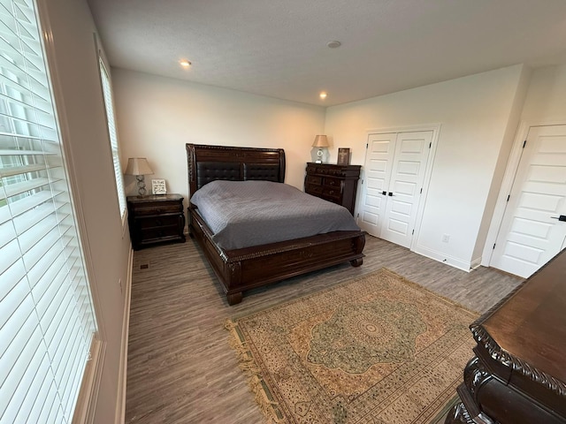 2497 Nelson Ln, Delaware, OH 43015 - bedroom featuring wood finished floors, baseboards, and recessed lighting