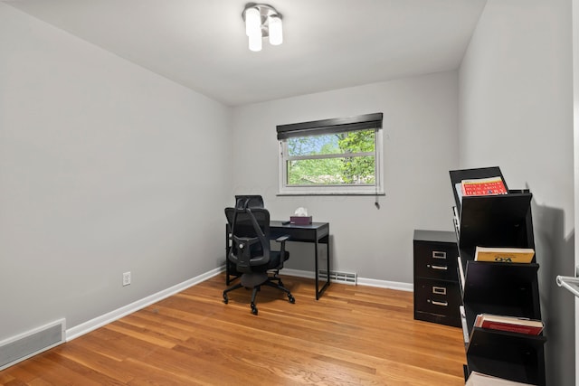 2629 Woodley Rd, Columbus, OH 43231 - office area with light wood-type flooring and baseboards
