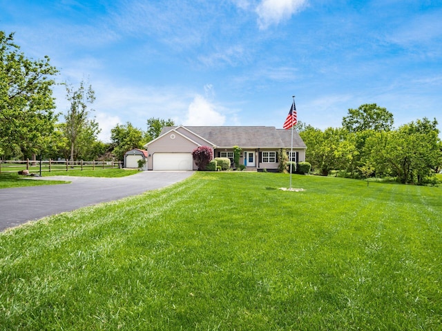 9148 Mccord Rd, Orient, OH 43146 - single story home with asphalt driveway and an attached garage