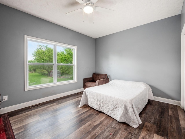 9148 Mccord Rd, Orient, OH 43146 - bedroom with wood finished floors, baseboards, and a ceiling fan
