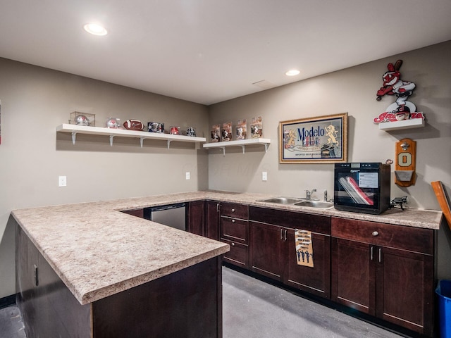 9148 Mccord Rd, Orient, OH 43146 - kitchen featuring open shelves, a sink, a peninsula, light countertops, and dark brown cabinetry
