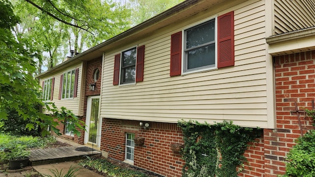 14780 Bellepoint Rd, Ostrander, OH 43061 - view of side of property featuring brick siding