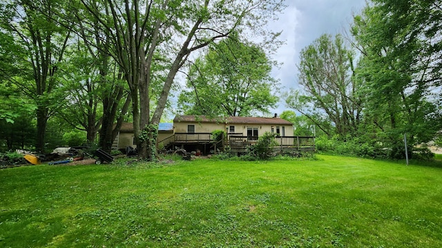 14780 Bellepoint Rd, Ostrander, OH 43061 - view of grassy yard with a deck