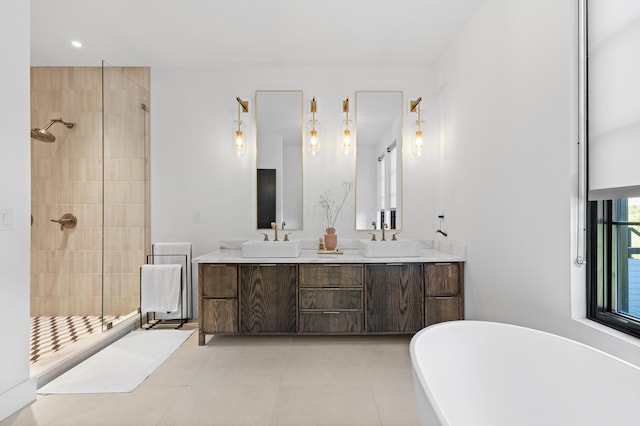 3318 S County Line Rd, Johnstown, OH 43031 - bathroom with a soaking tub, a shower stall, double vanity, tile patterned floors, and recessed lighting
