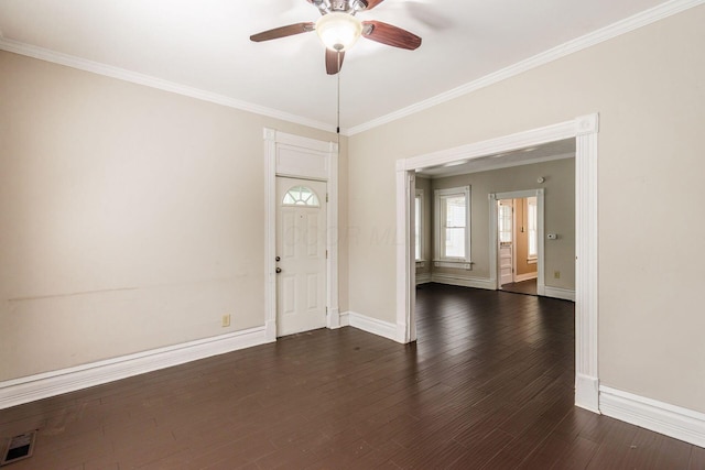 815 Hamlet St, Columbus, OH 43215 - entryway with a ceiling fan, baseboards, crown molding, and dark wood-style flooring