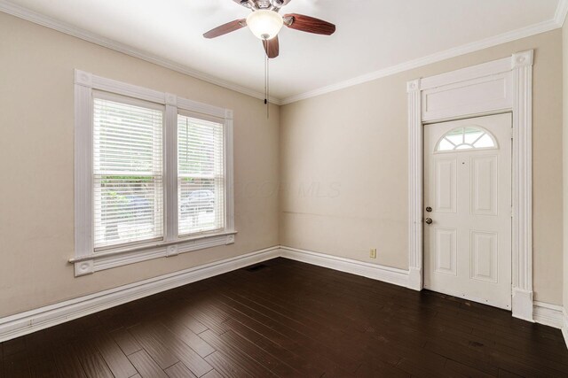 815 Hamlet St, Columbus, OH 43215 - entrance foyer featuring healthy amount of natural light, a ceiling fan, baseboards, and crown molding
