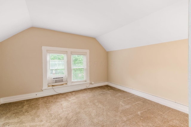 815 Hamlet St, Columbus, OH 43215 - bonus room featuring vaulted ceiling, carpet, and baseboards