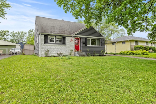1296 Bryson Rd, Columbus, OH 43224 - view of front of home featuring a front lawn and entry steps
