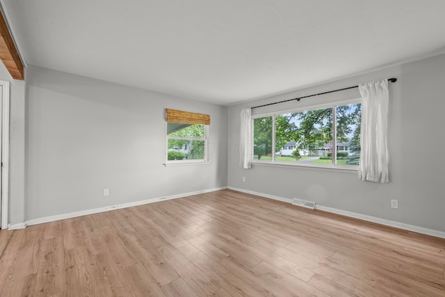 1296 Bryson Rd, Columbus, OH 43224 - spare room with light wood-type flooring and baseboards