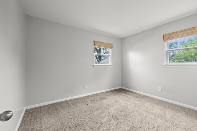 1296 Bryson Rd, Columbus, OH 43224 - empty room with carpet and baseboards