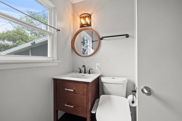 1296 Bryson Rd, Columbus, OH 43224 - half bathroom with vanity and toilet