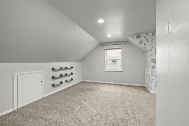 1296 Bryson Rd, Columbus, OH 43224 - bonus room with lofted ceiling, carpet, baseboards, and recessed lighting