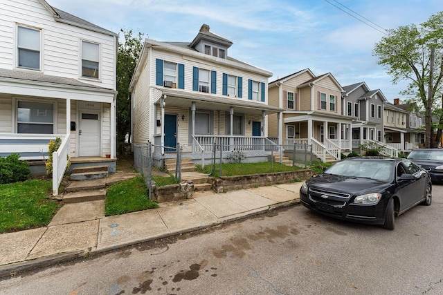 1808 S 6th St, Columbus, OH 43207 - view of property with a porch and a residential view