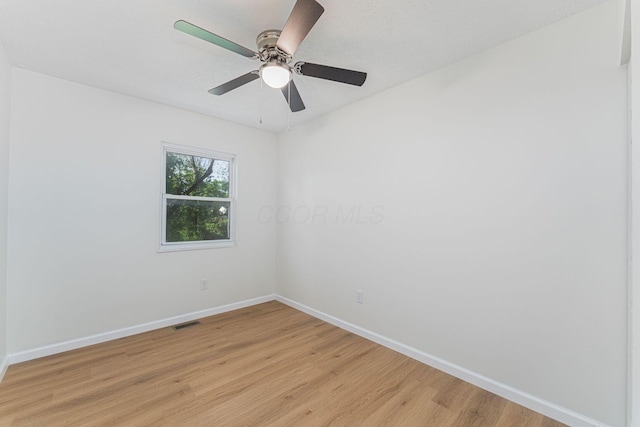 1747 E 25th Ave, Columbus, OH 43219 - empty room featuring baseboards, light wood-style floors, and a ceiling fan