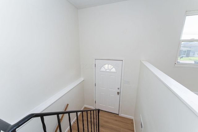 1747 E 25th Ave, Columbus, OH 43219 - doorway featuring wood finished floors and baseboards