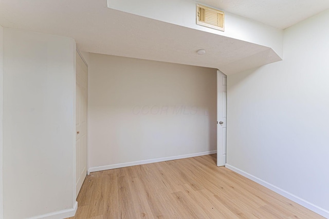1747 E 25th Ave, Columbus, OH 43219 - spare room with light wood-type flooring and baseboards