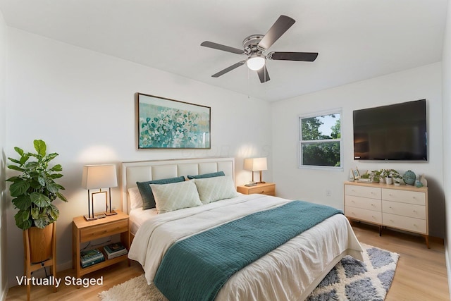 1747 E 25th Ave, Columbus, OH 43219 - bedroom featuring wood finished floors and ceiling fan