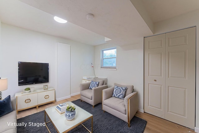 1747 E 25th Ave, Columbus, OH 43219 - living room with wood finished floors and baseboards