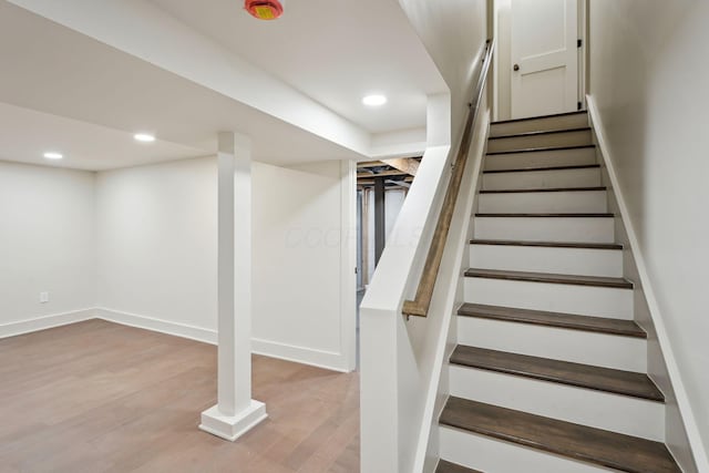 1884 W Lane Ave, Columbus, OH 43221 - stairway with wood finished floors, baseboards, and recessed lighting