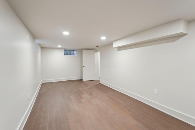 1884 W Lane Ave, Columbus, OH 43221 - finished below grade area with baseboards, recessed lighting, and wood finished floors