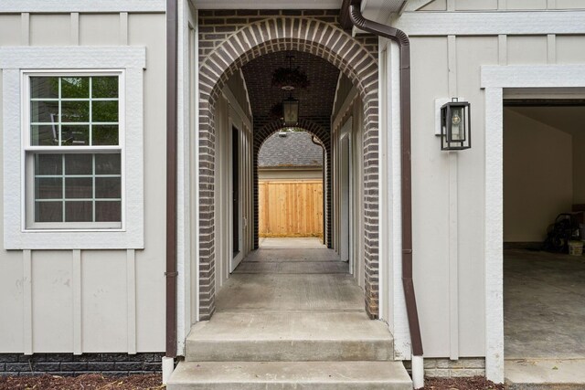 1884 W Lane Ave, Columbus, OH 43221 - entrance to property with board and batten siding