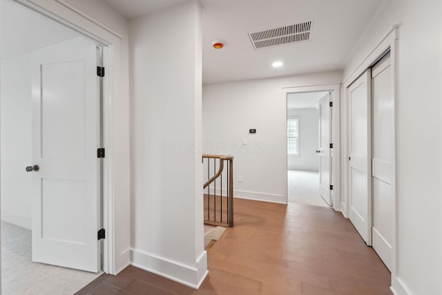 1884 W Lane Ave, Columbus, OH 43221 - hall with recessed lighting, baseboards, wood finished floors, and an upstairs landing