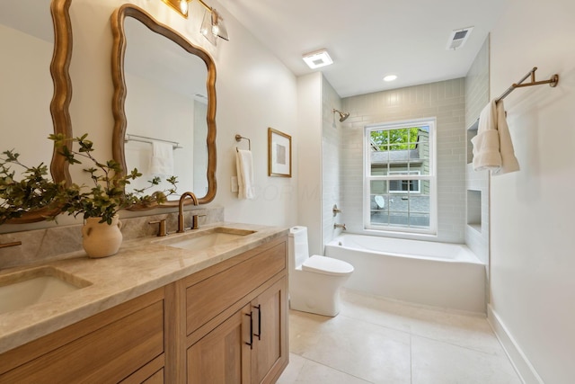 1884 W Lane Ave, Columbus, OH 43221 - full bath with tile patterned floors, double vanity, toilet, and bathing tub / shower combination