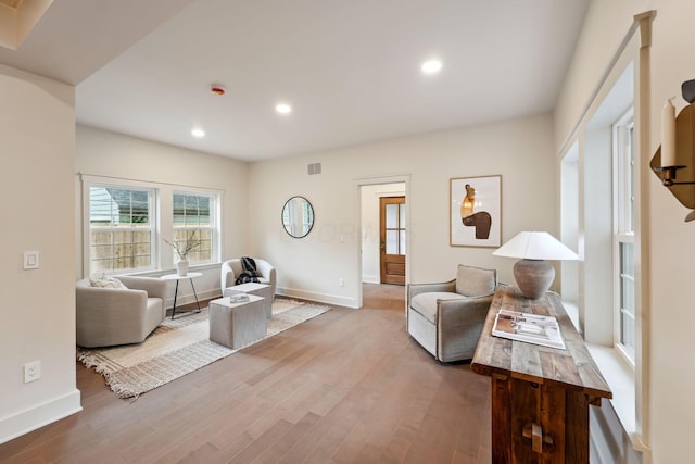 1884 W Lane Ave, Columbus, OH 43221 - living area with baseboards, wood finished floors, and recessed lighting