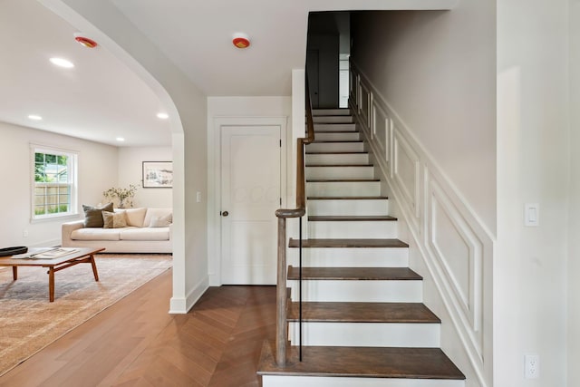 1884 W Lane Ave, Columbus, OH 43221 - stairway with arched walkways, recessed lighting, and baseboards