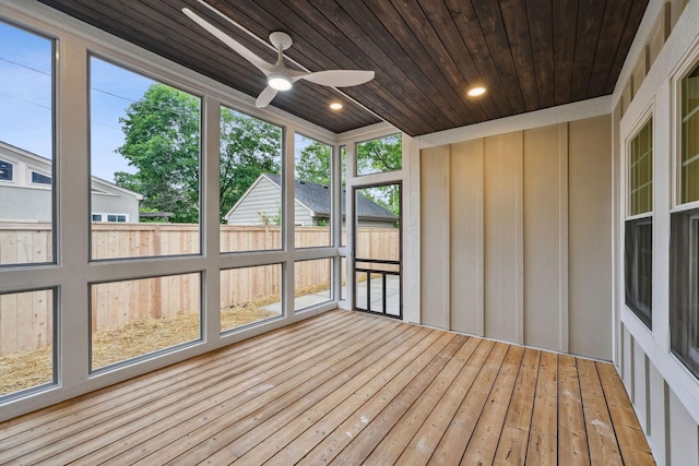 1884 W Lane Ave, Columbus, OH 43221 - unfurnished sunroom with wood ceiling, ceiling fan, wood-type flooring, and a wooden deck