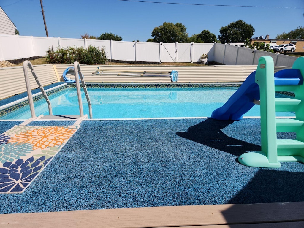148 N Ohio Ave, Lancaster, OH 43130 - view of pool featuring a water slide and a fenced backyard