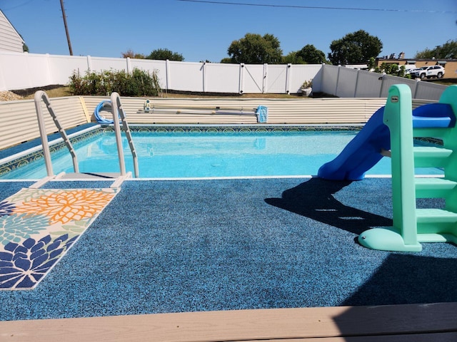 148 N Ohio Ave, Lancaster, OH 43130 - view of pool featuring a water slide and a fenced backyard