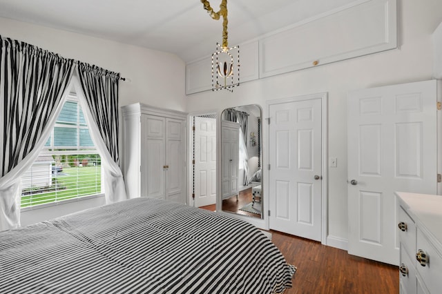 4088 Sweet Shadow Ave, Columbus, OH 43230 - bedroom featuring dark wood-style floors, vaulted ceiling, and arched walkways