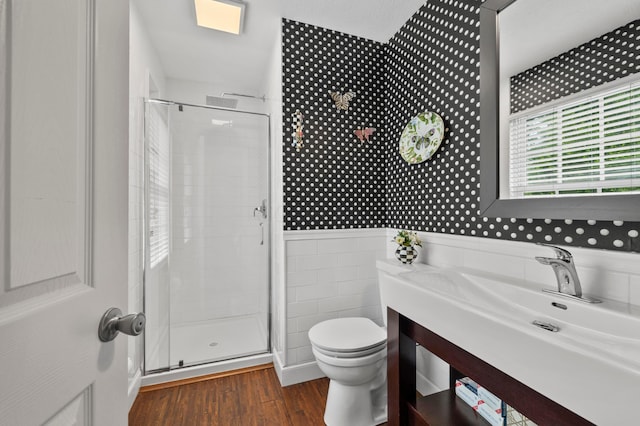 4088 Sweet Shadow Ave, Columbus, OH 43230 - full bath featuring a shower stall, toilet, wood finished floors, vanity, and a wainscoted wall
