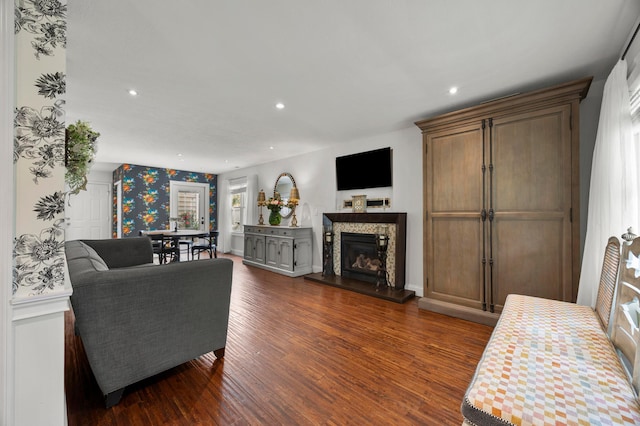 4088 Sweet Shadow Ave, Columbus, OH 43230 - living room with dark wood-type flooring, recessed lighting, a glass covered fireplace, and plenty of natural light