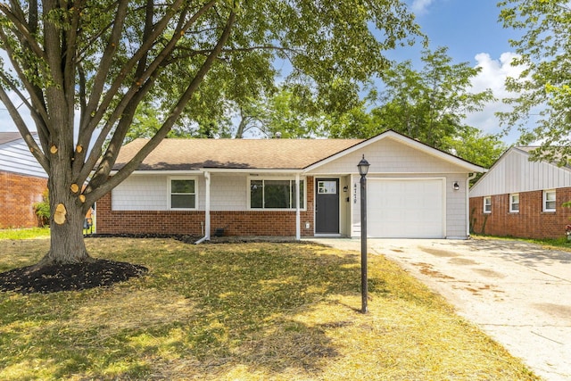 4778 Hafey Ave, Columbus, OH 43228 - ranch-style home featuring an attached garage, driveway, brick siding, and a front lawn