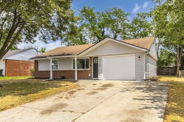 4778 Hafey Ave, Columbus, OH 43228 - ranch-style house with an attached garage, concrete driveway, brick siding, and a shingled roof