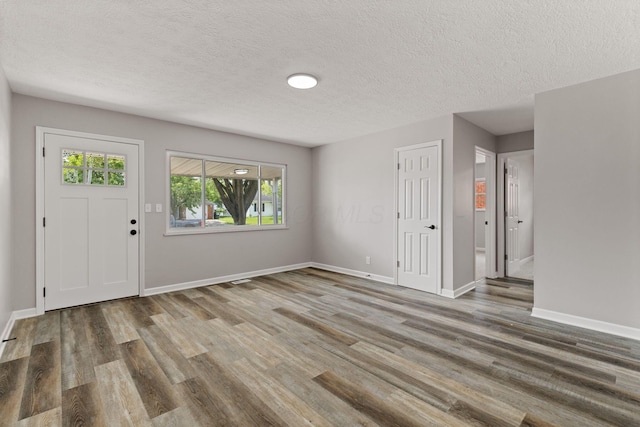4778 Hafey Ave, Columbus, OH 43228 - entrance foyer featuring wood finished floors and a textured ceiling