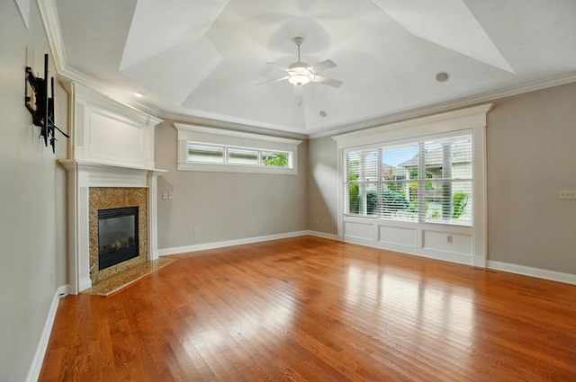 4993 Denbigh Ct, Columbus, OH 43220 - unfurnished living room featuring a fireplace, ornamental molding, a ceiling fan, and light wood-style flooring