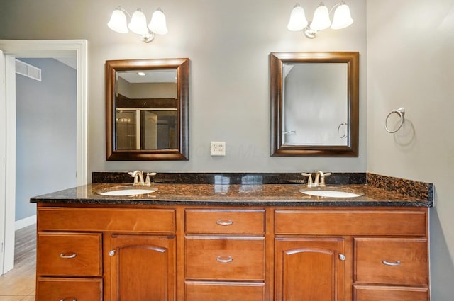 4993 Denbigh Ct, Columbus, OH 43220 - full bath with double vanity and a shower with door
